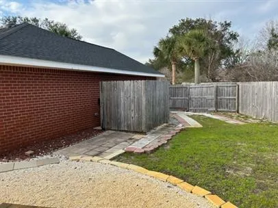 a view of a backyard with a garden