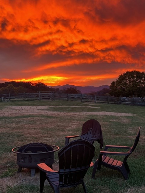 85 Ridgemont Lane Ellijay, GA 30536 - Photo 12 of 42 a view of a lake with a car parked