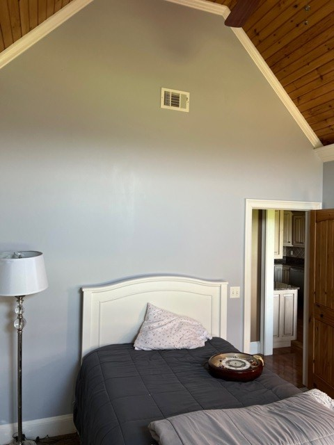 85 Ridgemont Lane Ellijay, GA 30536 - Photo 17 of 42 a bedroom with a bed and lamp