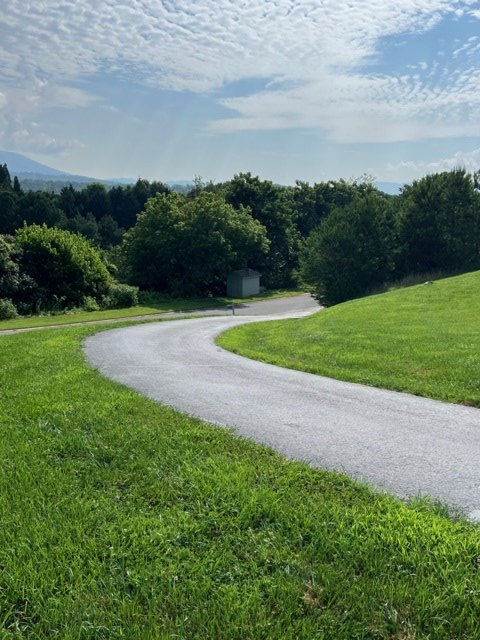 85 Ridgemont Lane Ellijay, GA 30536 - Photo 24 of 42 a view of a golf course with a lake