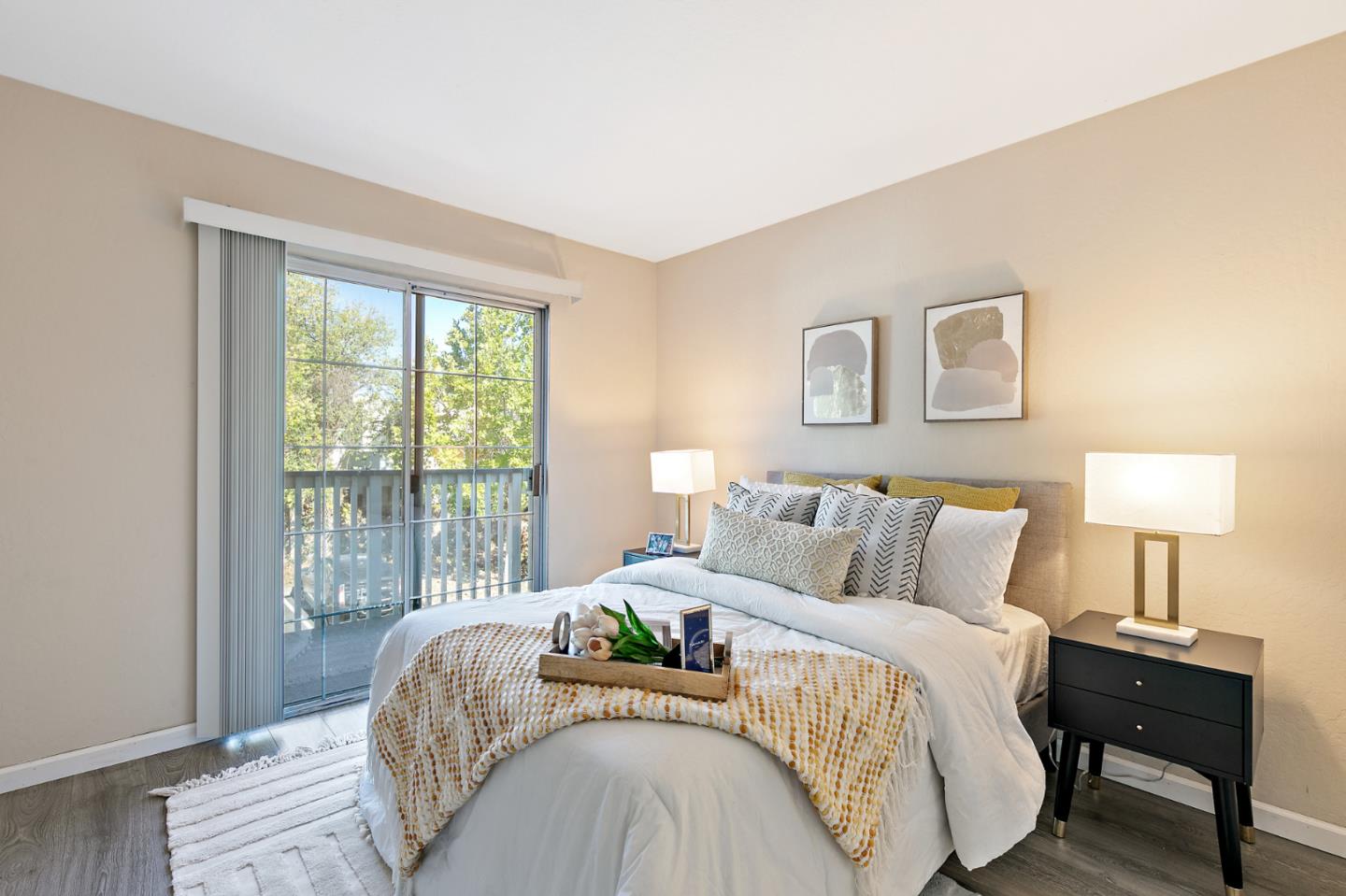 101 Redding Road, Unit A6 Campbell, CA 95008 - Photo 17 of 28 a bedroom with a bed and a lamp