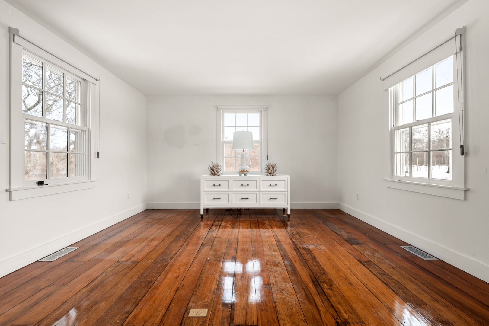 6 Fargo Way Nantucket, MA 02554 - Photo 20 of 28 a view of a room with wooden floor and windows