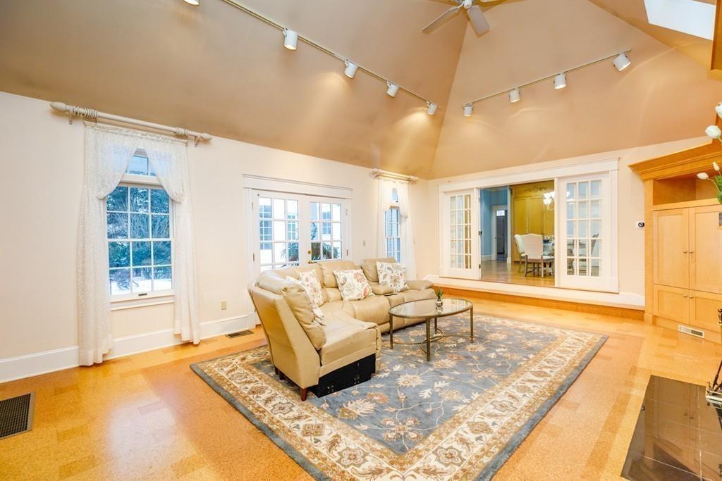 23 MacMillan Drive Concord, MA 01742 - Photo 19 of 41 a living room with furniture and a large window