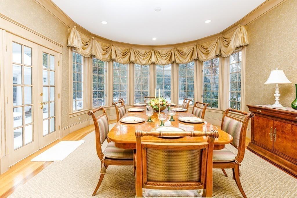 23 MacMillan Drive Concord, MA 01742 - Photo 21 of 41 a view of a dining room with furniture window and wooden floor