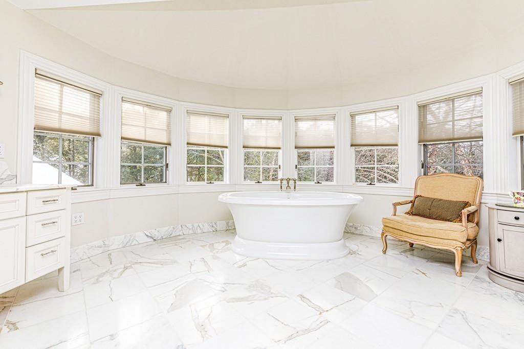 23 MacMillan Drive Concord, MA 01742 - Photo 24 of 41 a living room with furniture and windows