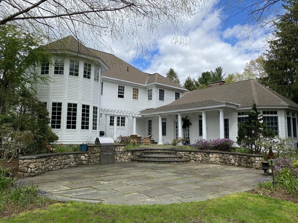 23 MacMillan Drive Concord, MA 01742 - Photo 38 of 41 a front view of a house with swimming pool