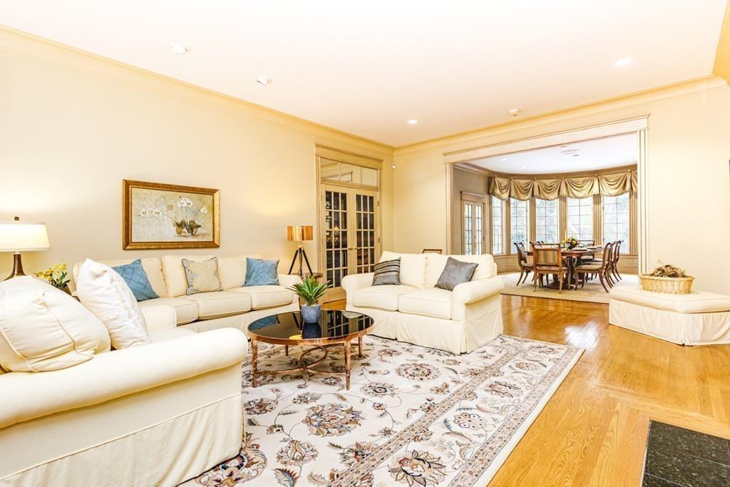 23 MacMillan Drive Concord, MA 01742 - Photo 6 of 41 a living room with furniture and a couch