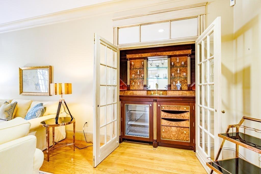 23 MacMillan Drive Concord, MA 01742 - Photo 9 of 41 a view of walk in closet with clothes and shoes