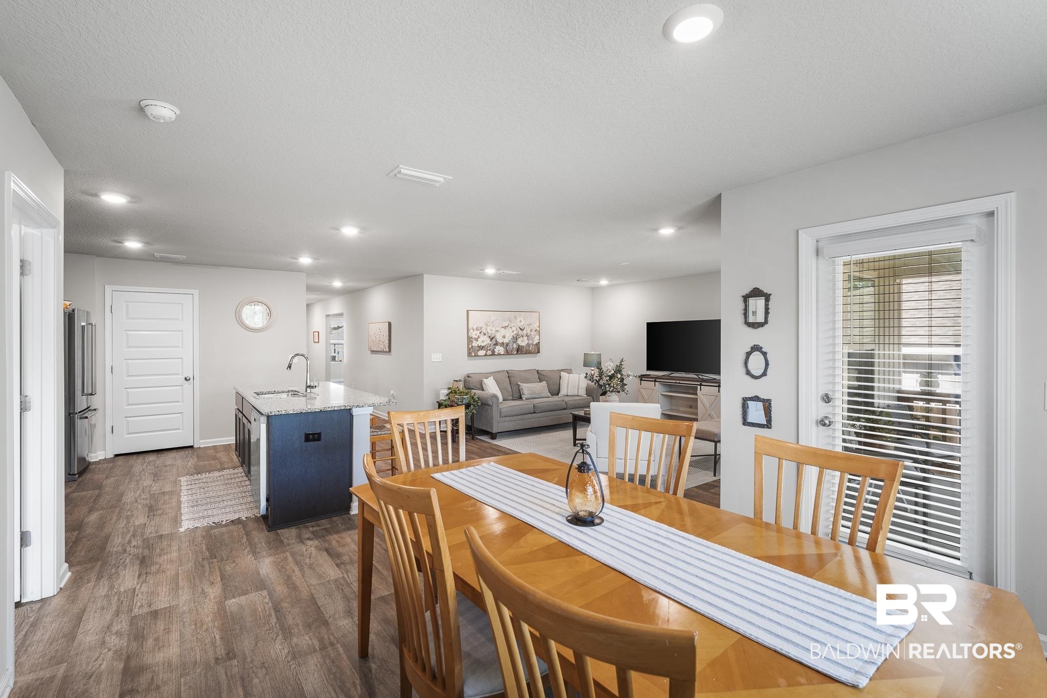 10232 Brodick Loop Spanish Fort, AL 36527 - Photo 9 of 29 Dining room with wood finished floors, recessed lighting, and baseboards