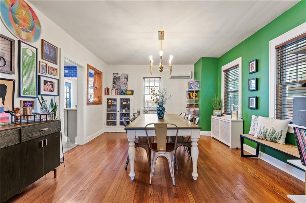 531 Peebles Street Pittsburgh, PA 15221 - Photo 13 of 30 a view of a dining room with furniture and wooden floor