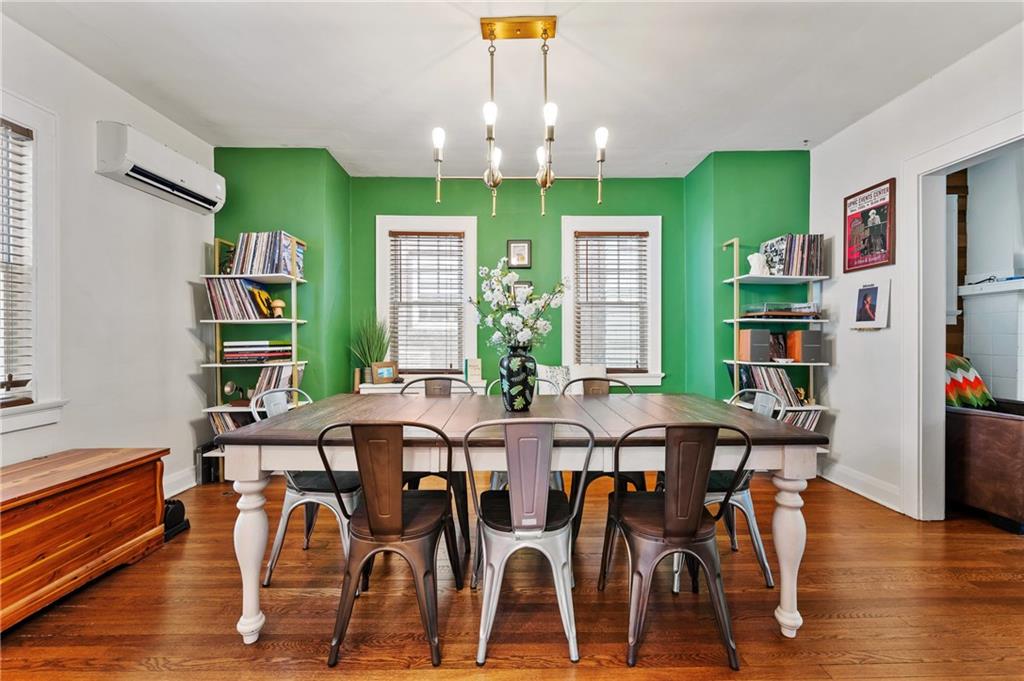 531 Peebles Street Pittsburgh, PA 15221 - Photo 14 of 30 a view of a dining room with furniture window and wooden floor