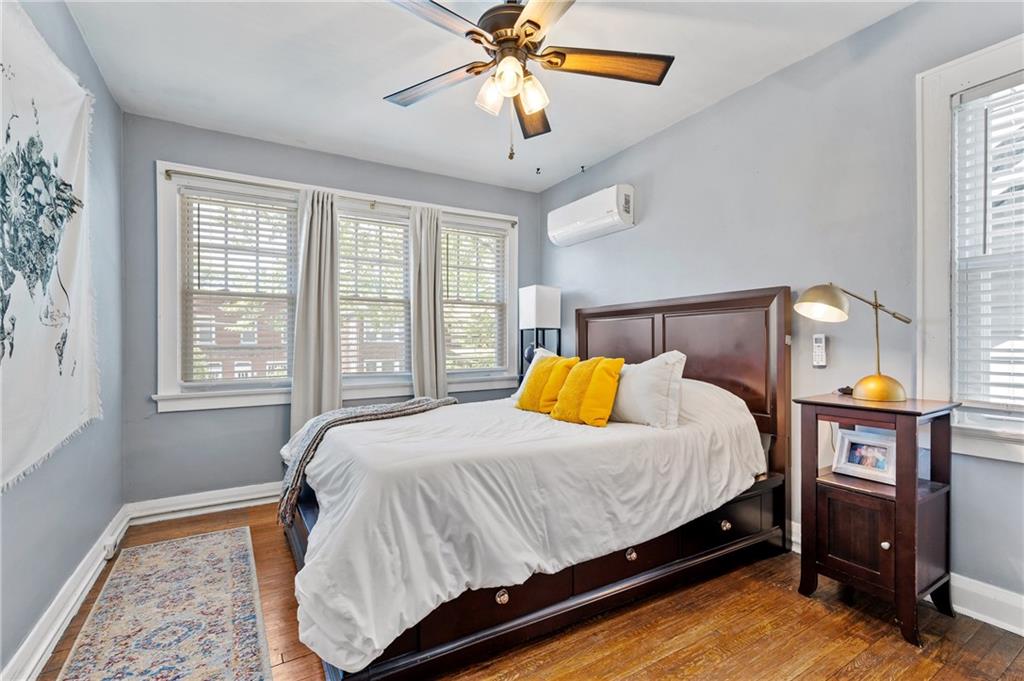 531 Peebles Street Pittsburgh, PA 15221 - Photo 21 of 30 a bedroom with a bed and window