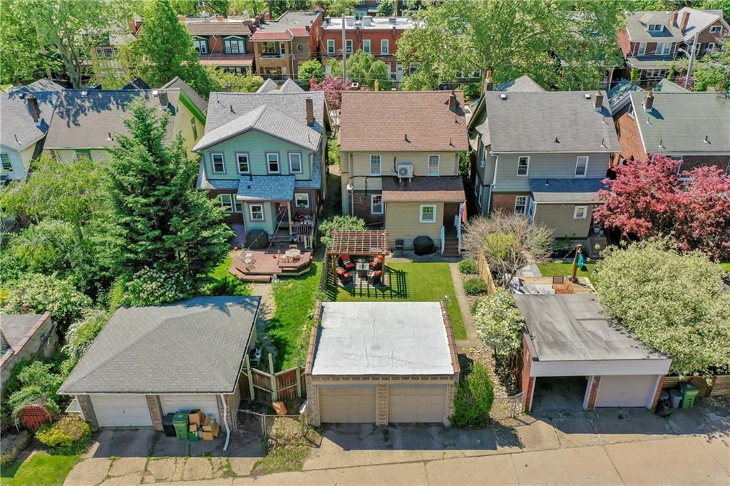 531 Peebles Street Pittsburgh, PA 15221 - Photo 28 of 30 an aerial view of a house with table and chairs
