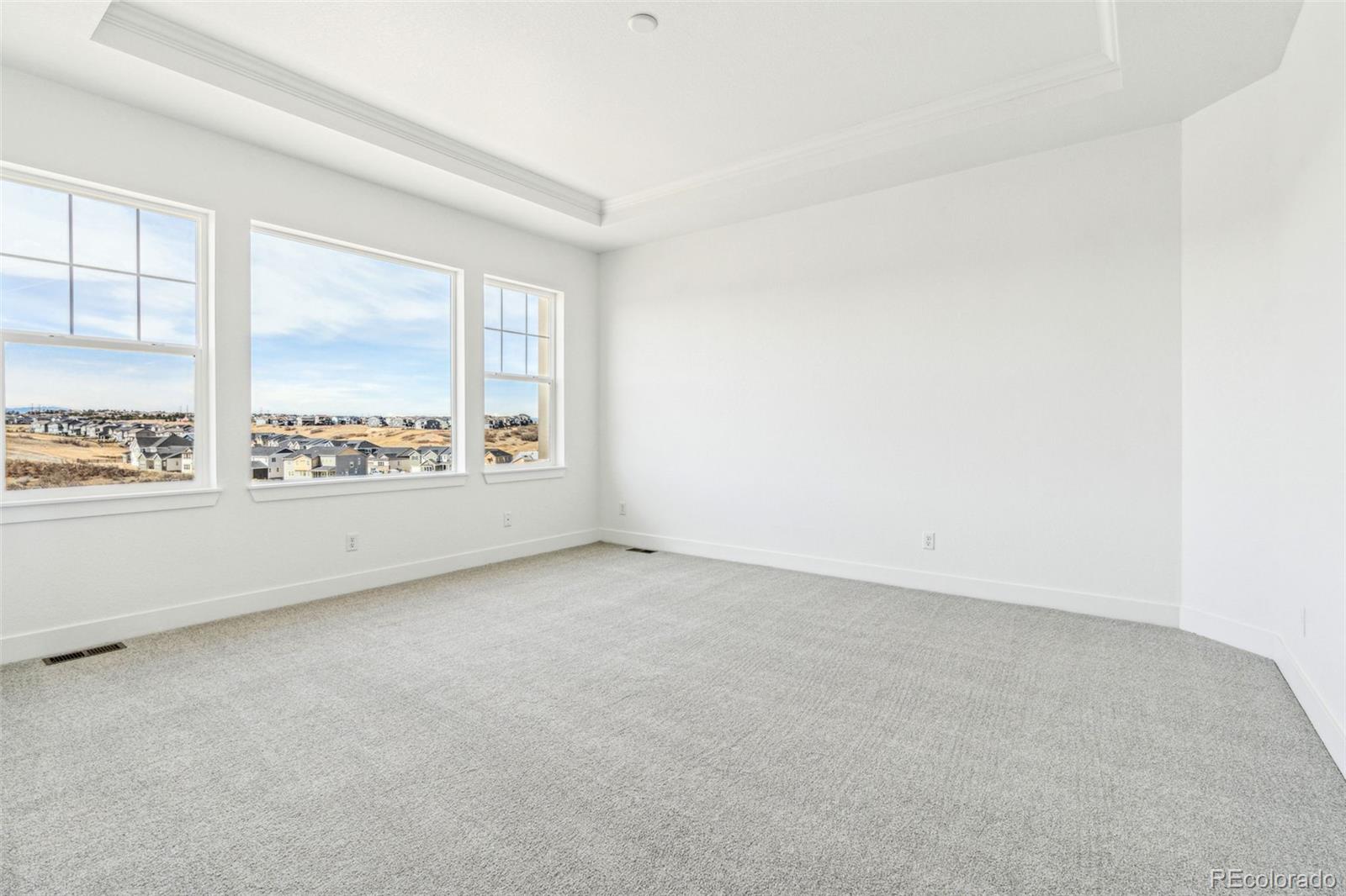 3884 Freestone Point Castle Rock, CO 80108 - Photo 17 of 34 an empty room with a window