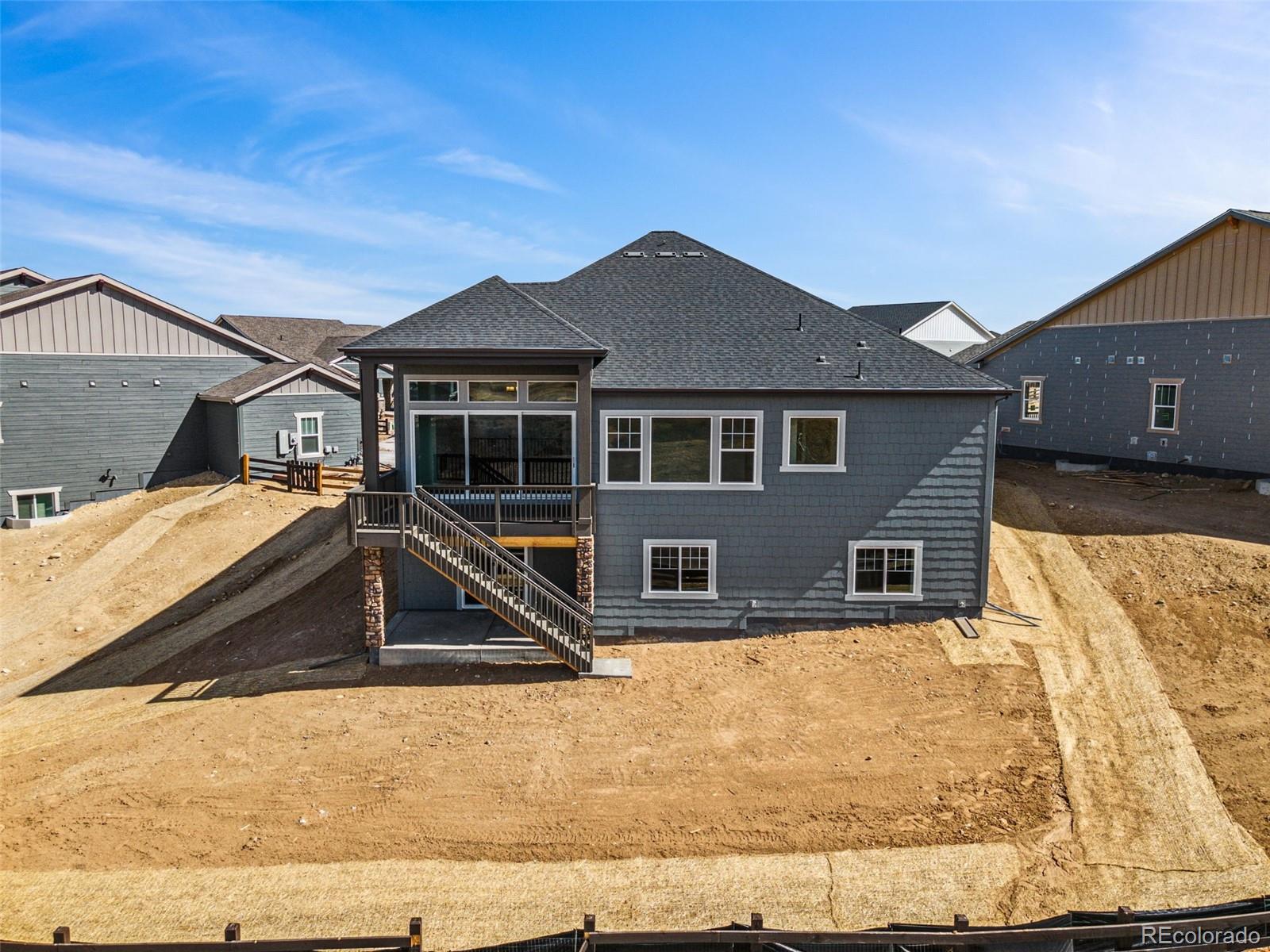 3884 Freestone Point Castle Rock, CO 80108 - Photo 29 of 34 a house view with a outdoor space