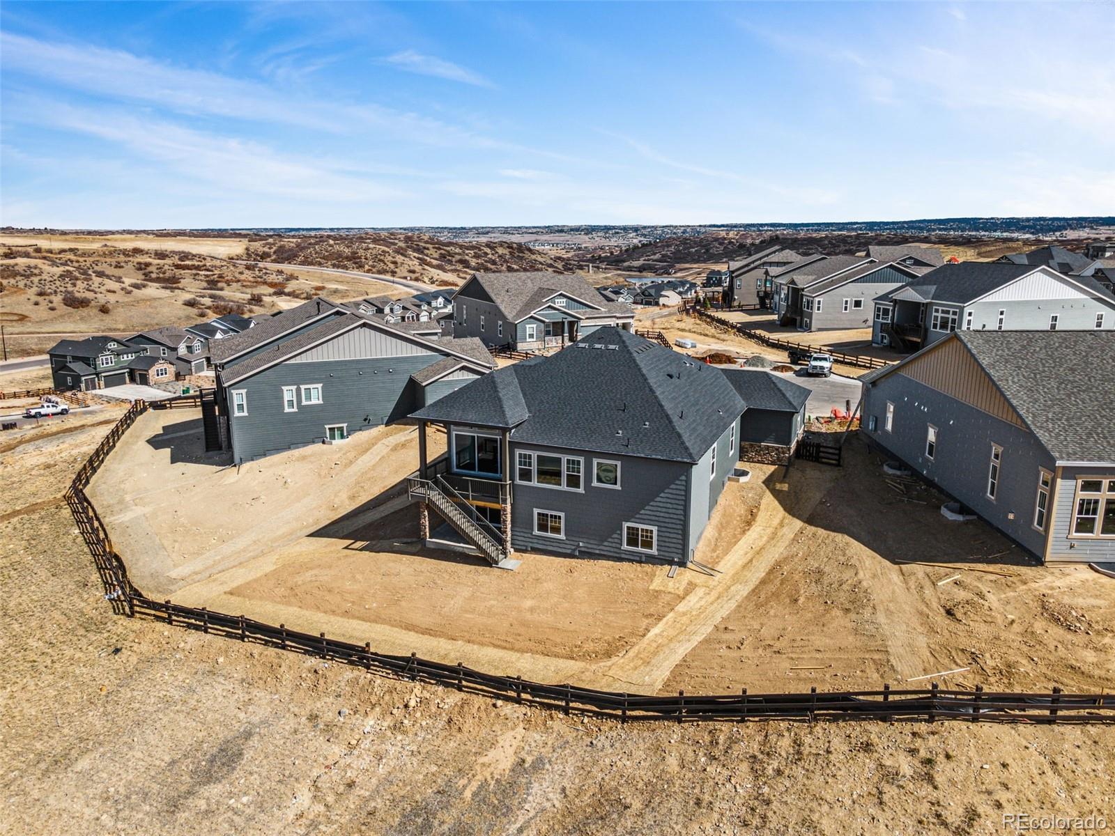 3884 Freestone Point Castle Rock, CO 80108 - Photo 30 of 34 an aerial view of residential houses with outdoor space