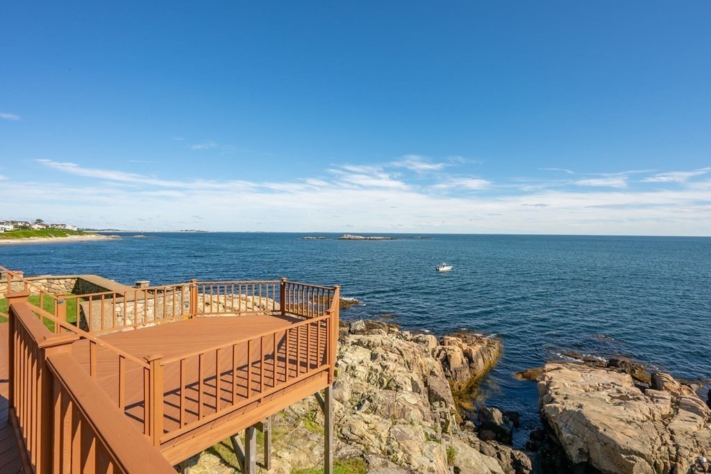 475 Jerusalem Road Cohasset, MA 02025 - Photo 13 of 41 a view of a terrace with lawn chairs