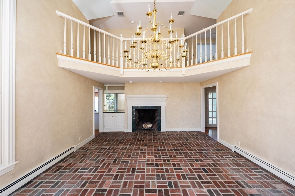 475 Jerusalem Road Cohasset, MA 02025 - Photo 16 of 41 a view of a livingroom with a fireplace
