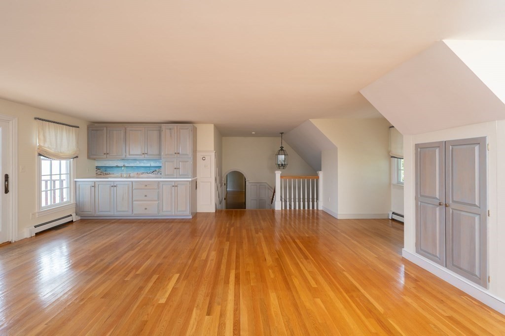 475 Jerusalem Road Cohasset, MA 02025 - Photo 22 of 41 a view of a kitchen with wooden floor and a kitchen