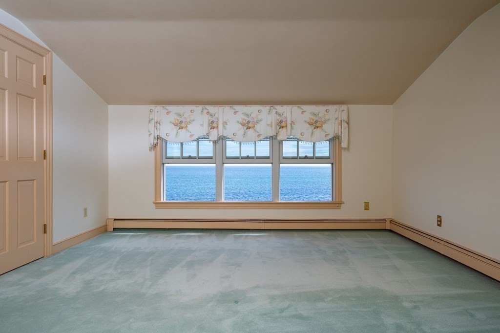475 Jerusalem Road Cohasset, MA 02025 - Photo 28 of 41 a view of wooden floor and window in an empty room
