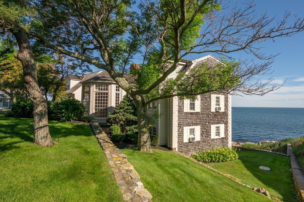 475 Jerusalem Road Cohasset, MA 02025 - Photo 30 of 41 a front view of a house with a yard
