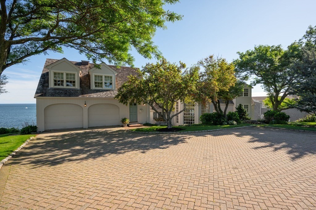 475 Jerusalem Road Cohasset, MA 02025 - Photo 3 of 41 a front view of a house with a yard and garage