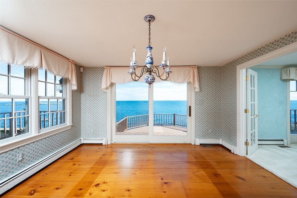 475 Jerusalem Road Cohasset, MA 02025 - Photo 6 of 41 a view of a room with a chandelier and living room