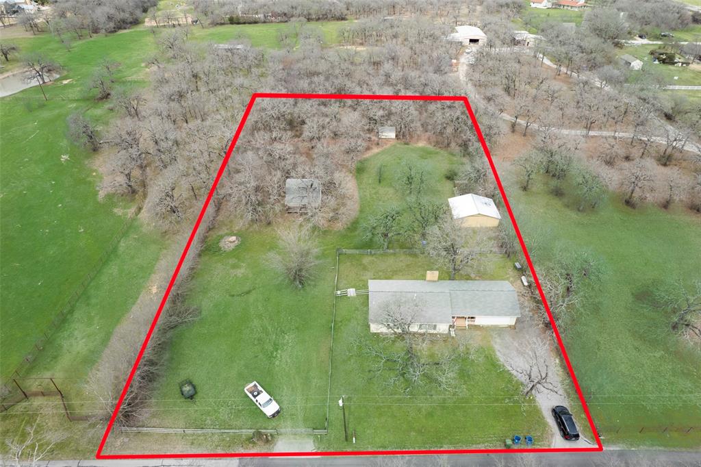 1403 East Harpole Road Argyle, TX 76226 - Photo 1 of 1 a view of a backyard