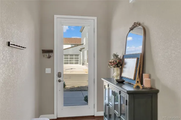 a view of a bathroom with a sink and mirror