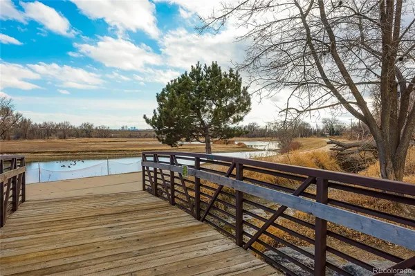 a view of wooden floor with a lake