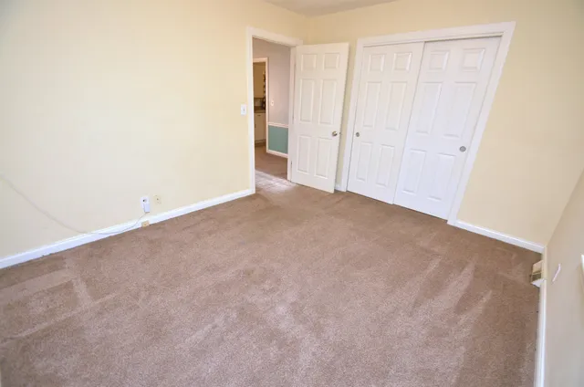 an empty room with windows