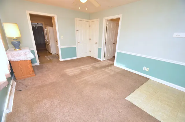 a room with table and chairs