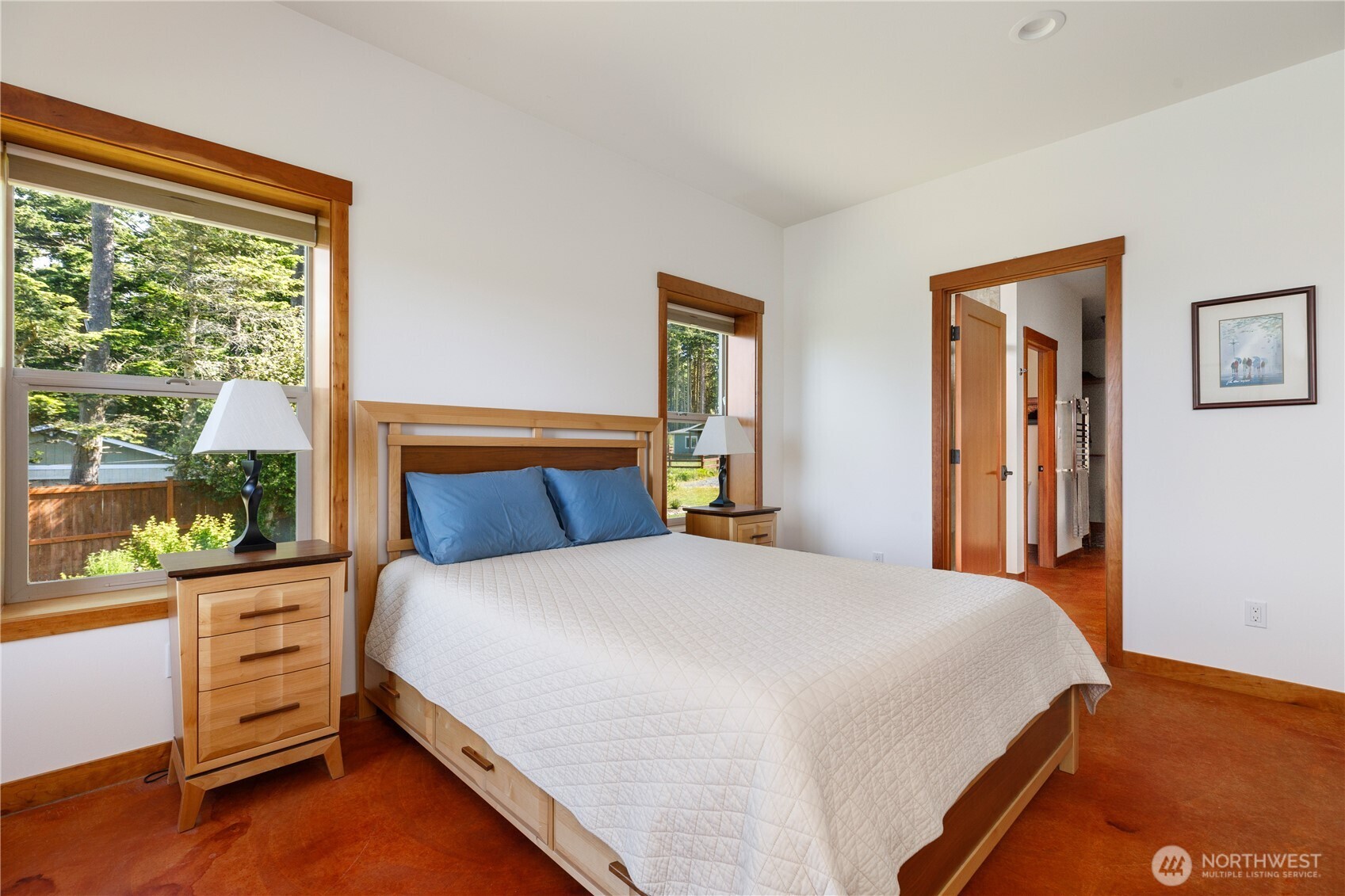 1335 Crestline Terrace Oak Harbor, WA 98277 - Photo 17 of 39 a bedroom with a bed and with windows