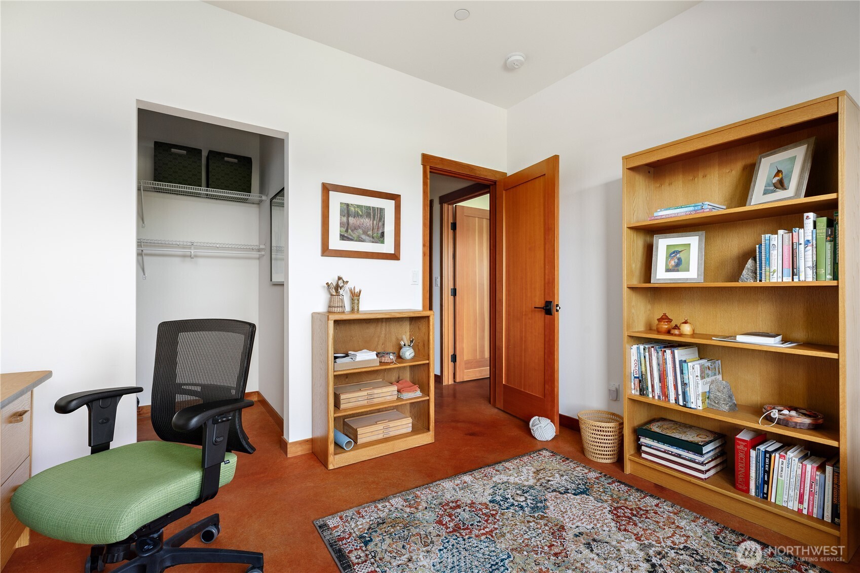 1335 Crestline Terrace Oak Harbor, WA 98277 - Photo 24 of 39 a view of a livingroom with furniture and a book shelf