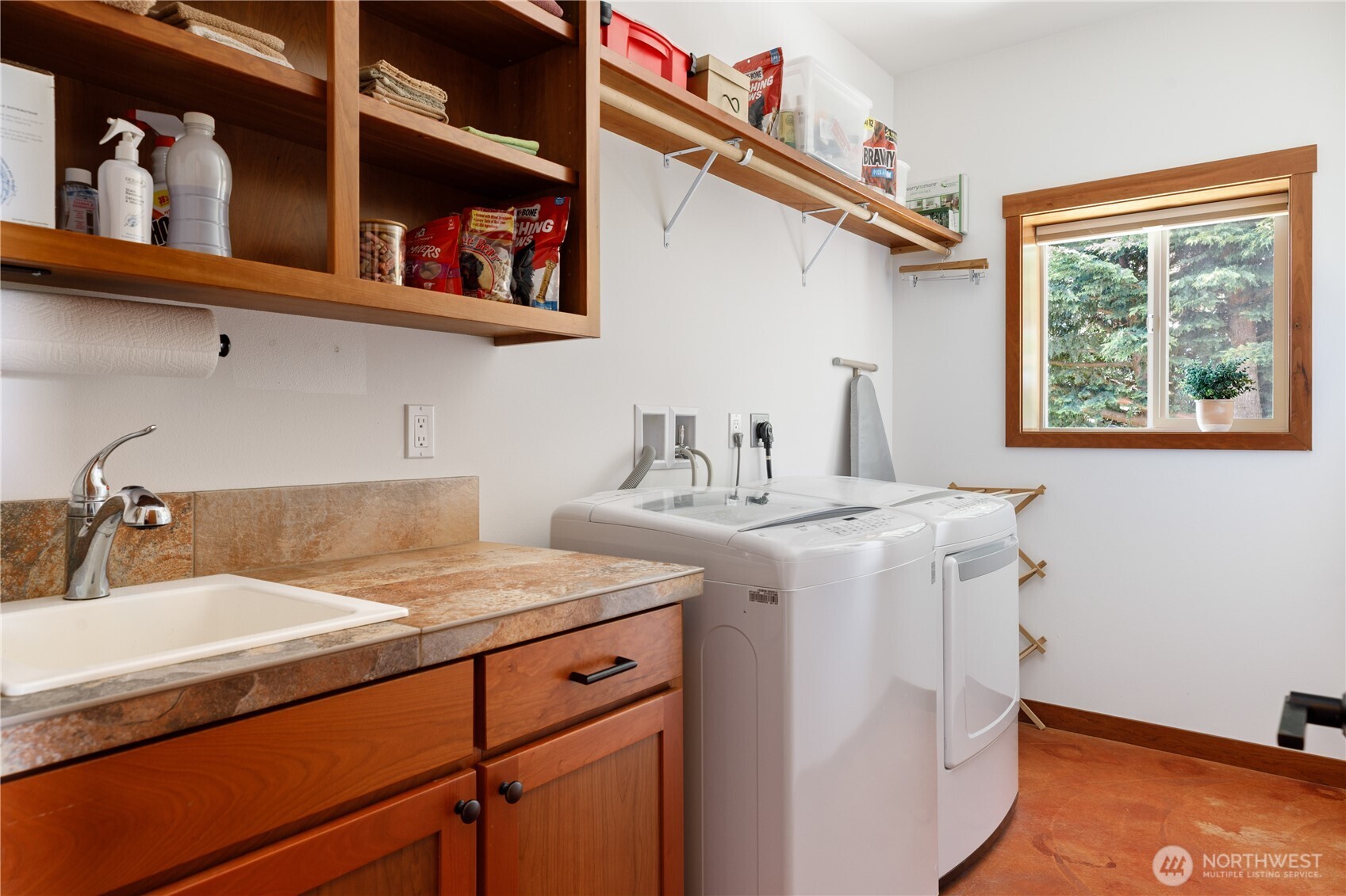 1335 Crestline Terrace Oak Harbor, WA 98277 - Photo 30 of 39 a kitchen with a sink and cabinets