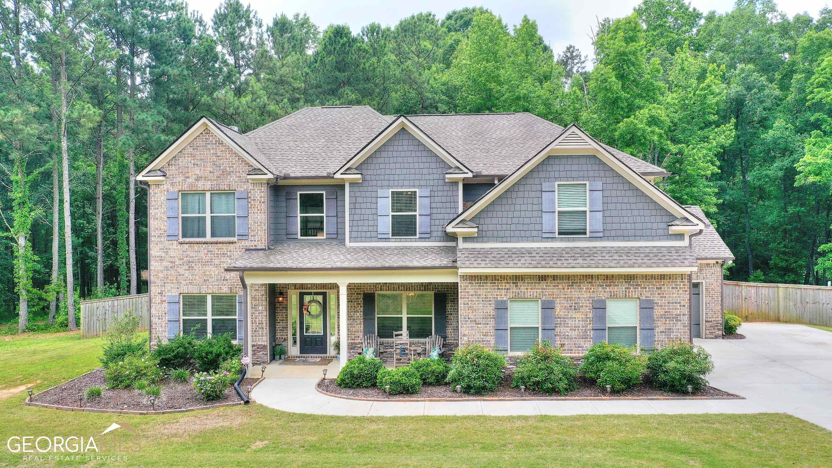 1800 Sardis Church Road Monroe, GA 30655 - Photo 1 of 1 a front view of a house with a yard