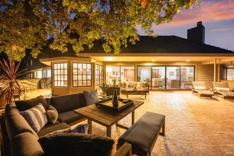 a building outdoor space with patio furniture