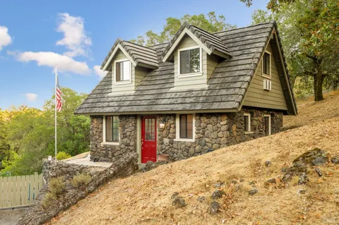 a view of house with a outdoor space