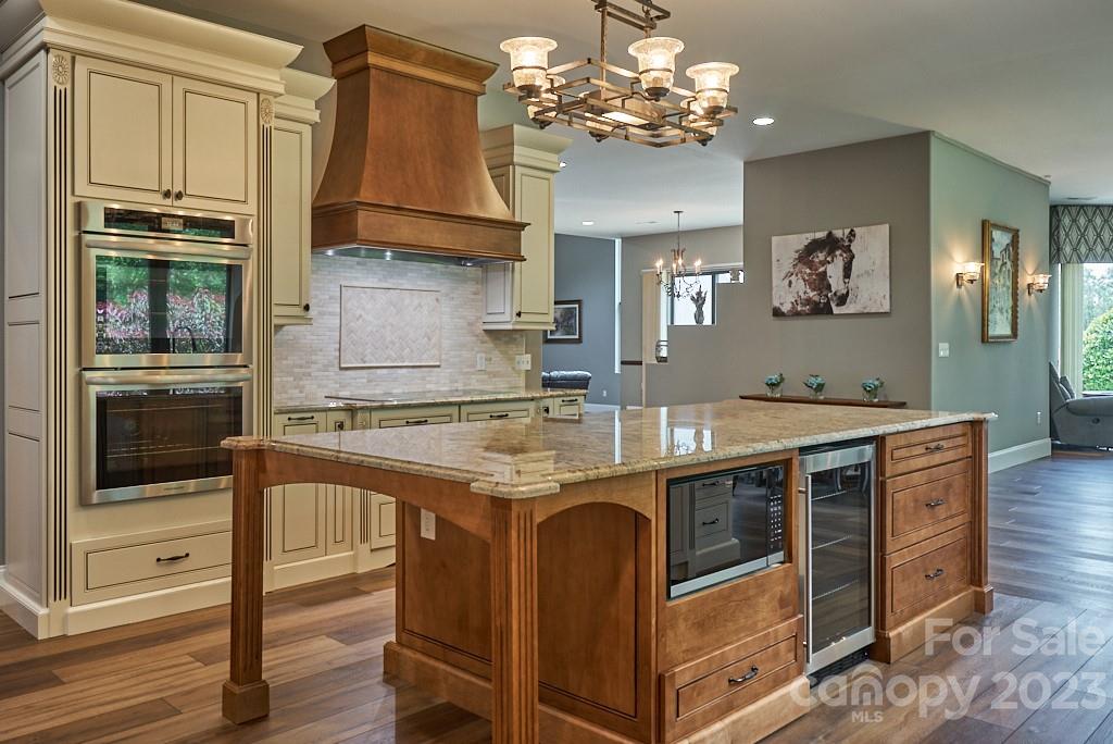 290 Stable Gate Drive Campobello, SC 29322 - Photo 21 of 39 a kitchen with stainless steel appliances granite countertop a stove and a refrigerator