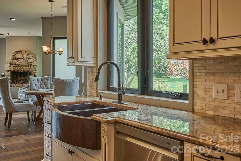 290 Stable Gate Drive Campobello, SC 29322 - Photo 22 of 39 a kitchen with stainless steel appliances granite countertop a sink and a window