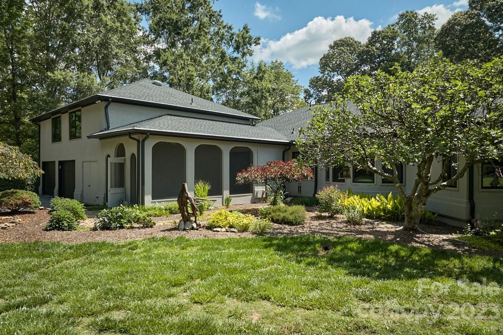 290 Stable Gate Drive Campobello, SC 29322 - Photo 4 of 39 a front view of a house with garden