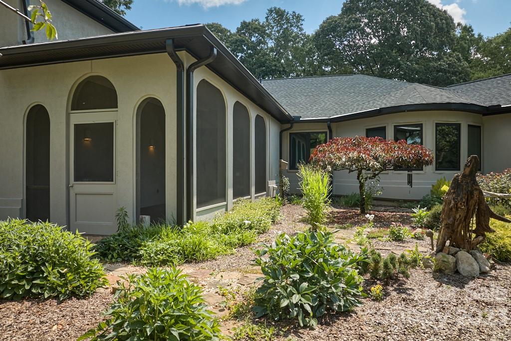 290 Stable Gate Drive Campobello, SC 29322 - Photo 5 of 39 a front view of a house with garden