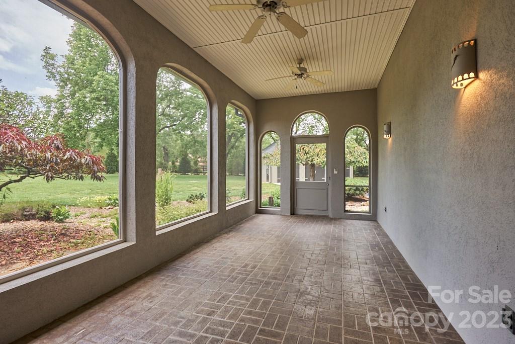 290 Stable Gate Drive Campobello, SC 29322 - Photo 10 of 39 a view of a room with windows and wooden floor