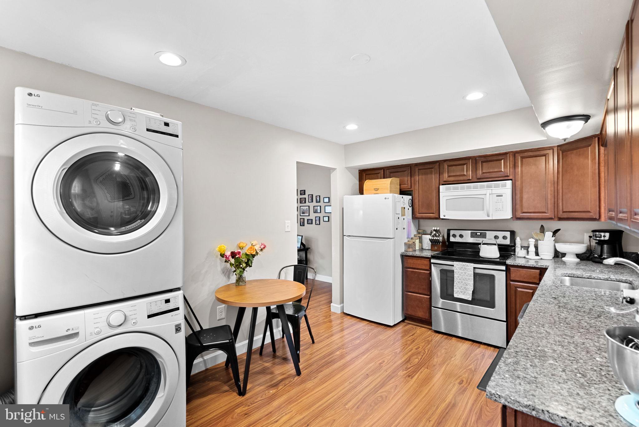 219 Josephine Street Berryville, VA 22611 - Photo 12 of 26 a view of kitchen with stainless steel appliances granite countertop a refrigerator a stove top oven a sink and dishwasher