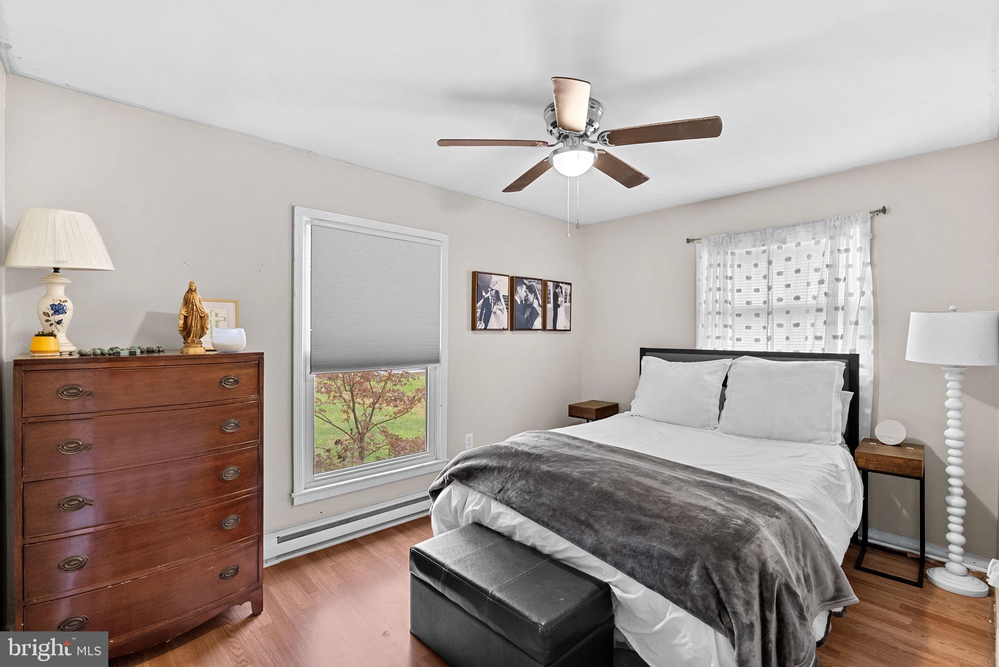 219 Josephine Street Berryville, VA 22611 - Photo 14 of 26 a bedroom with a large bed and a window