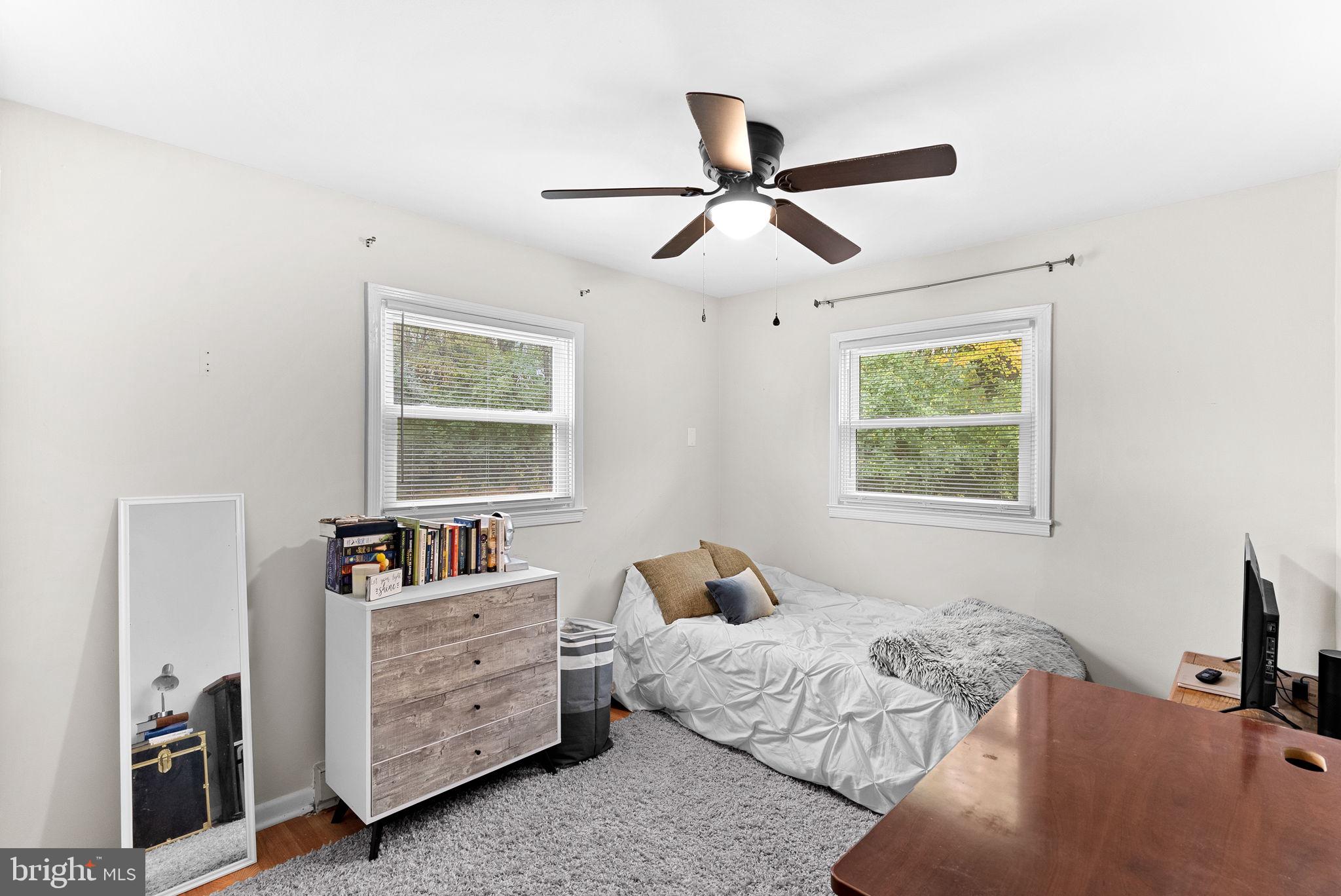 219 Josephine Street Berryville, VA 22611 - Photo 18 of 26 a bedroom with a bed and a window