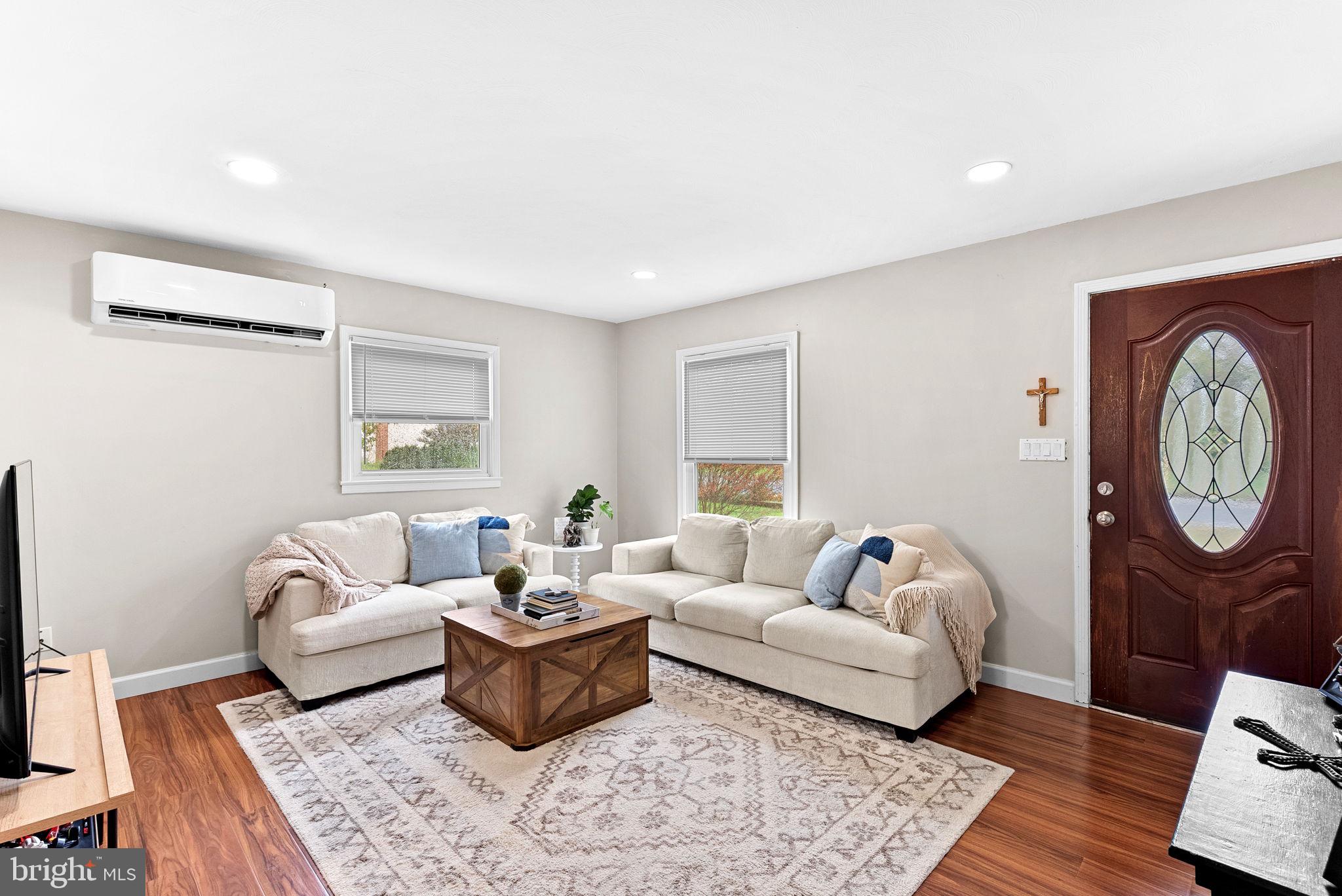 219 Josephine Street Berryville, VA 22611 - Photo 4 of 26 a living room with furniture and a window