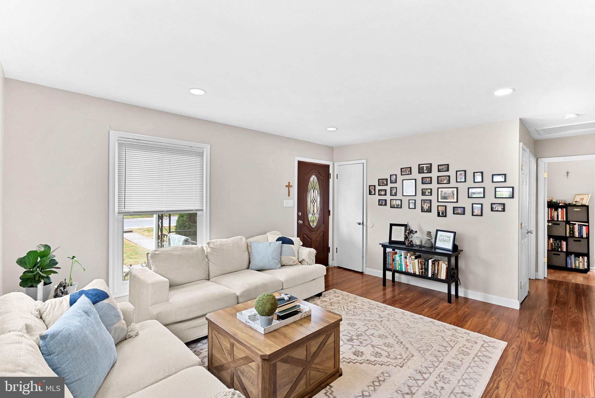 219 Josephine Street Berryville, VA 22611 - Photo 6 of 26 a living room with furniture and a wooden floor