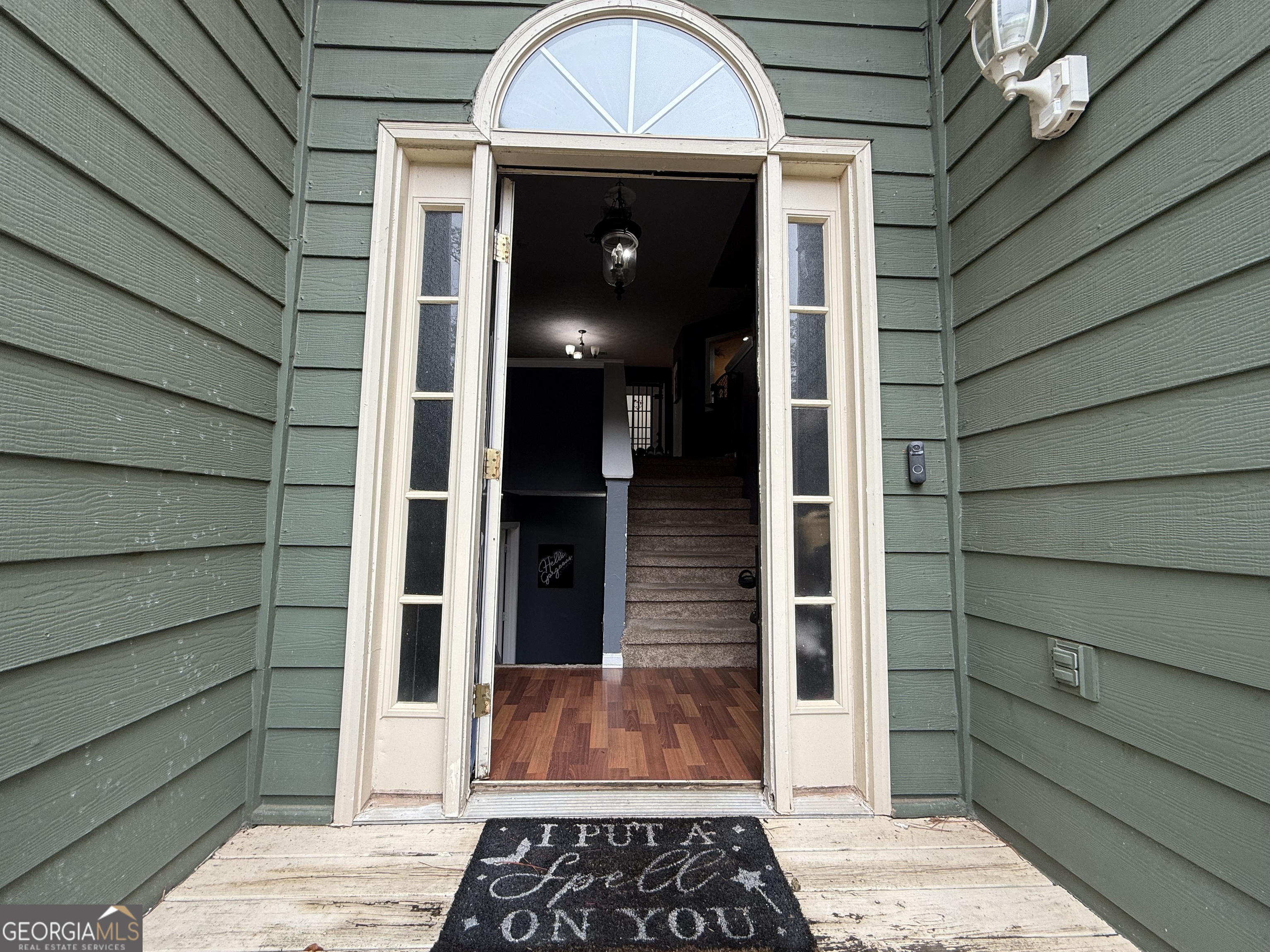 55 Jill Lane Covington, GA 30016 - Photo 2 of 52 a view of a door of the house