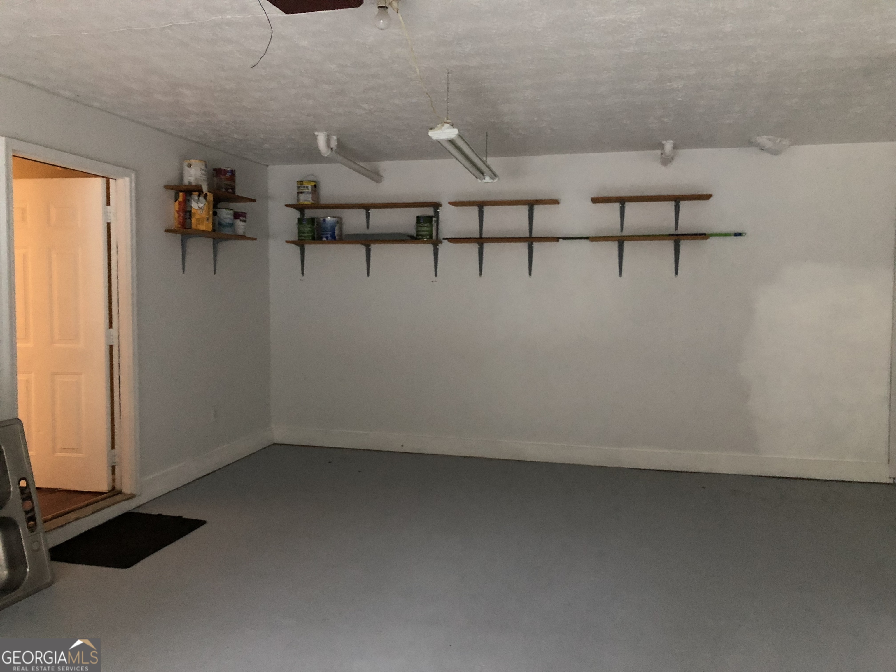 55 Jill Lane Covington, GA 30016 - Photo 25 of 52 a view of a room with gym equipment